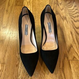 Black suede Prada platform heels size 39. Heels measure 4 inches.